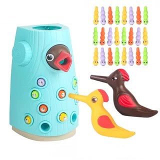 Woodpecker eats catching bug fishing toy