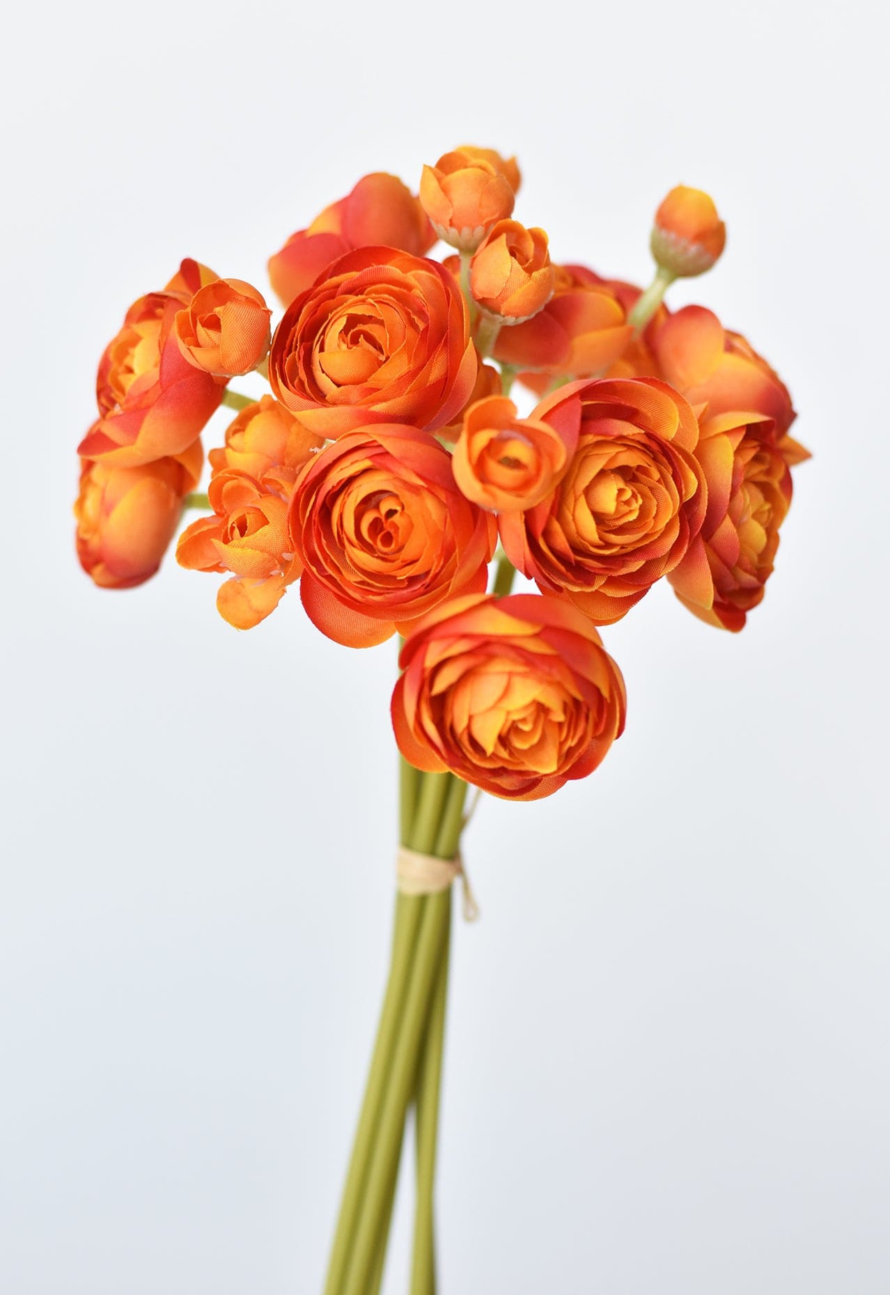 10.5" Faux Peachy Orange Ranunculus Stem Bundle