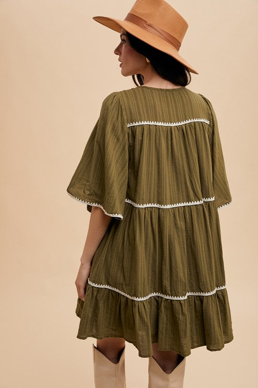 Tassel Contrast Trim Tie Neck Half Sleeve Tiered Dress – Bohemian Tassel Details, Contrast Trim, and Tiered Design for a Flowing, Feminine Look